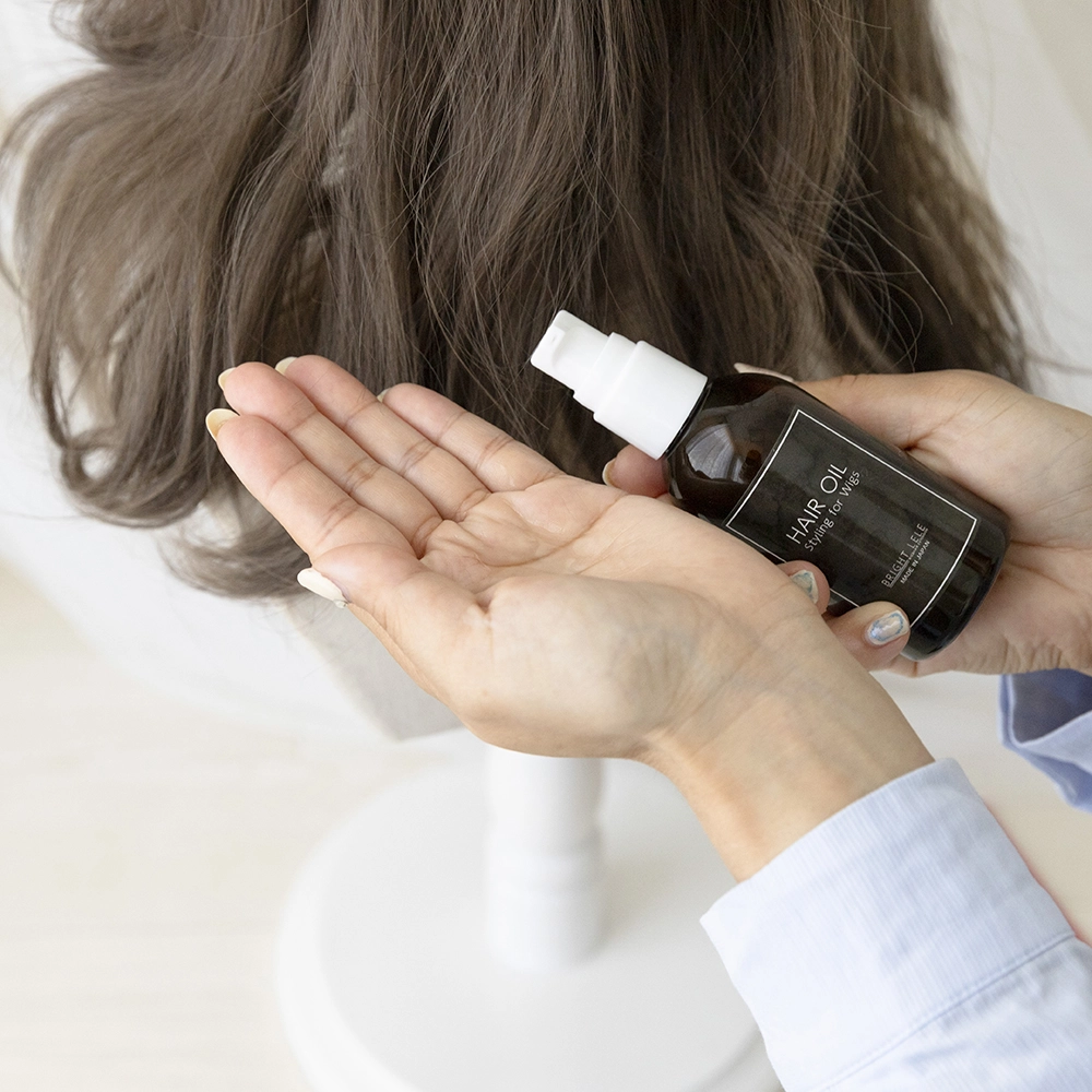 ウィッグを傷めにくい専用スタイリング剤